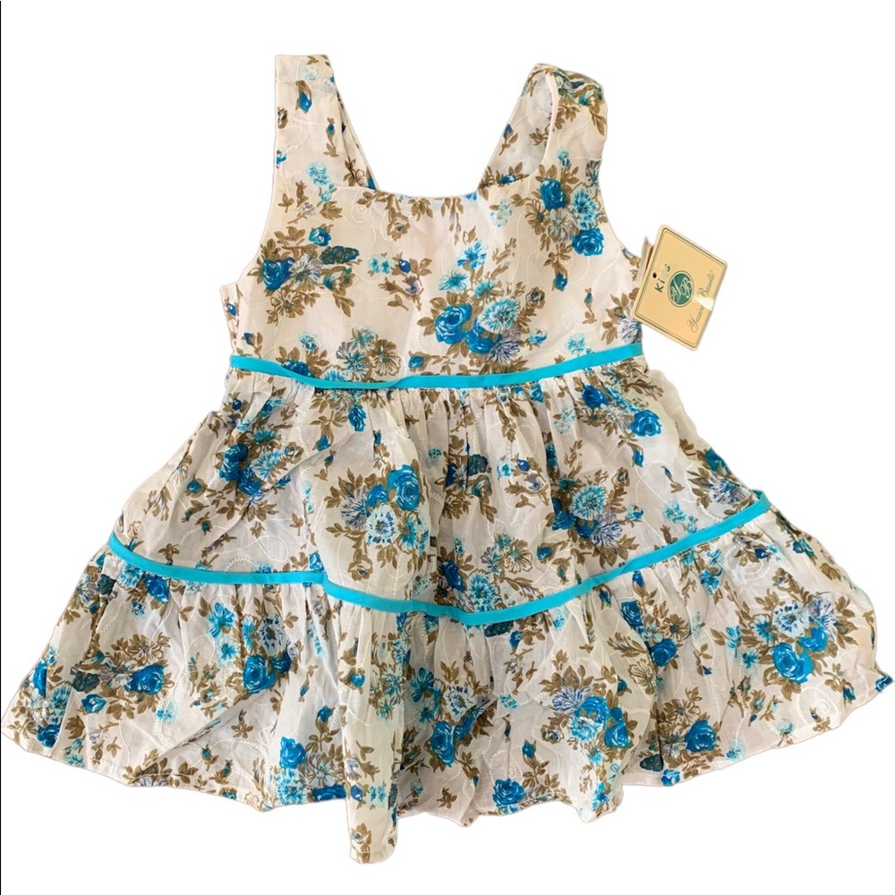 Flowy, Airy and Light Dress. Beautiful Blue Flower Detail.